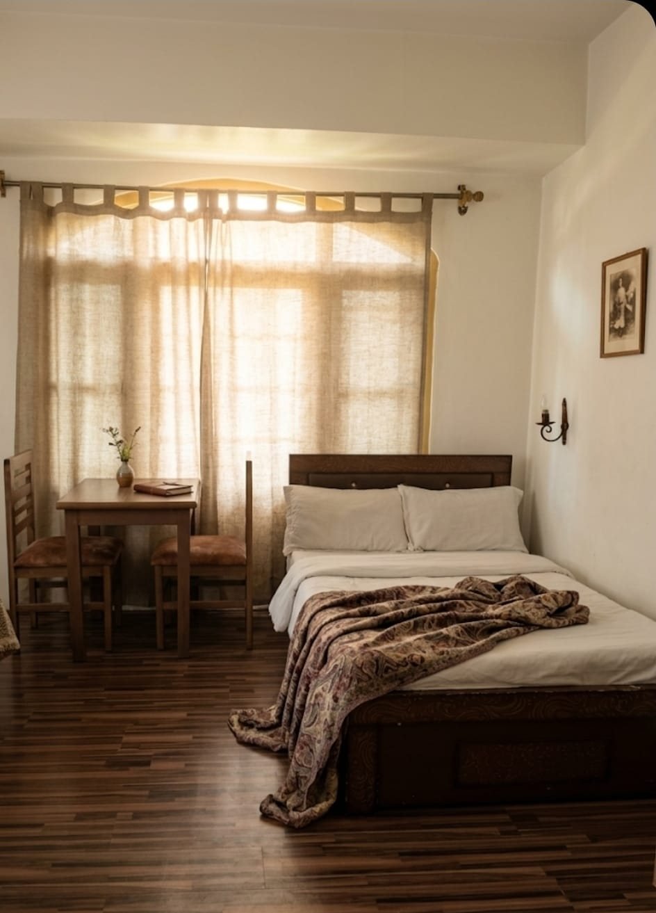 Warm deluxe room with Kashmiri textiles
